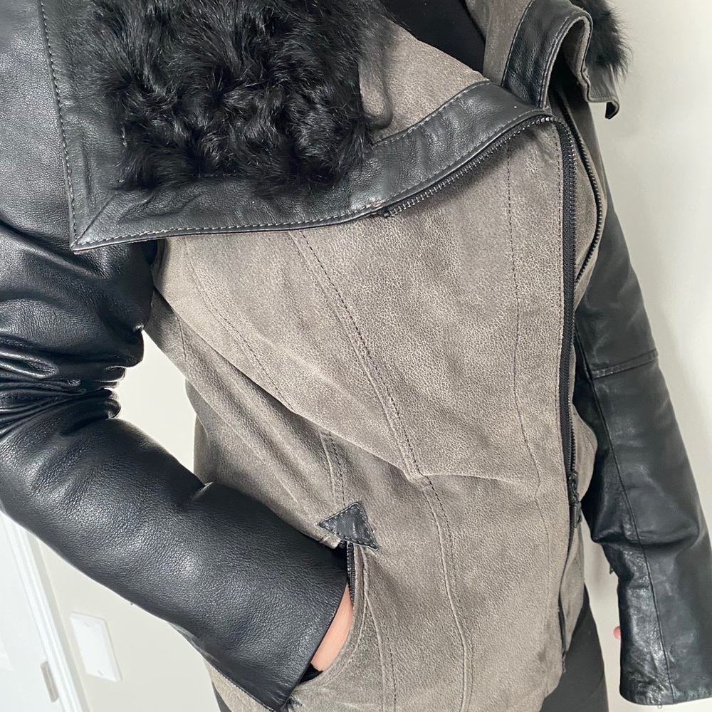 Leather jacket with natural fur collar